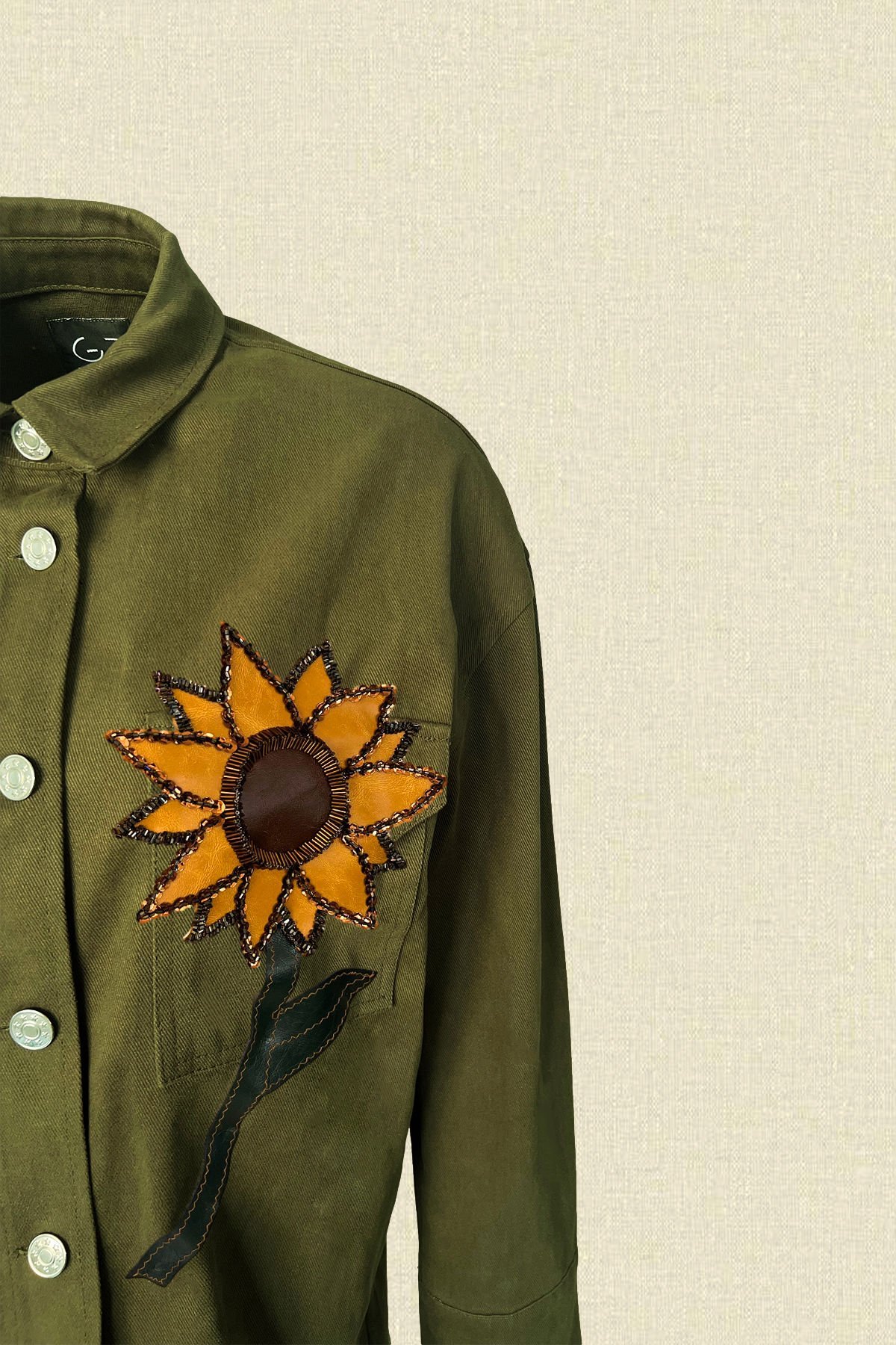 Deri Üzeri Boncuk İşlemeli Ayçiçeği Figürlü Uzun Yeşil Renk Jean Ceket