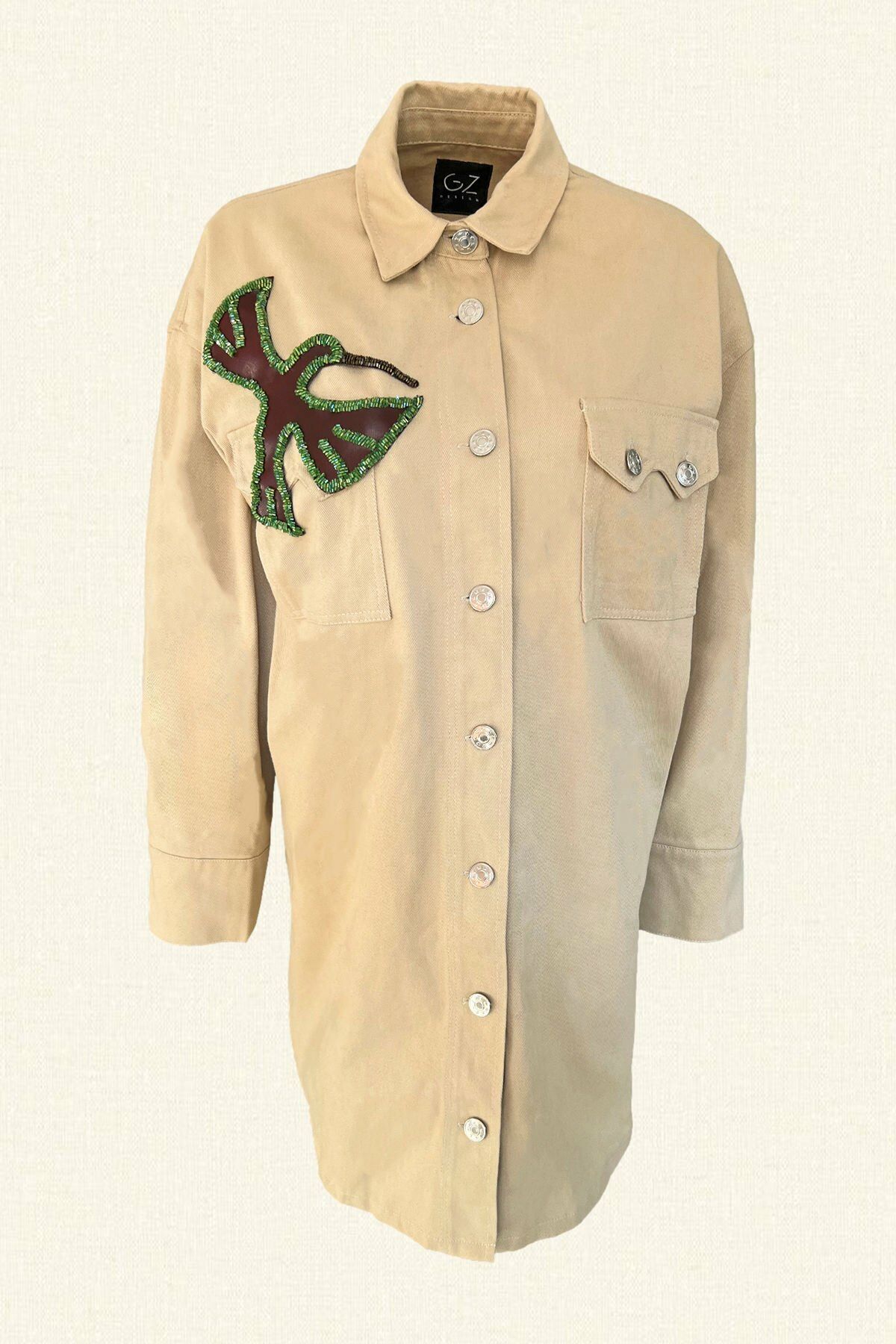 Bordo Deri Üzeri Yeşil Boncuk İşlemeli Kuş Figürlü Uzun Krem Renk Jean Ceket